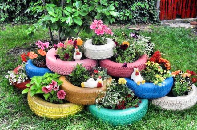 Decoração de jardim Pneus velhos como vasos coloridos