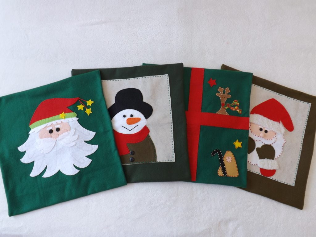 Capas de almofadas em diversos estampas para decorar seu Natal